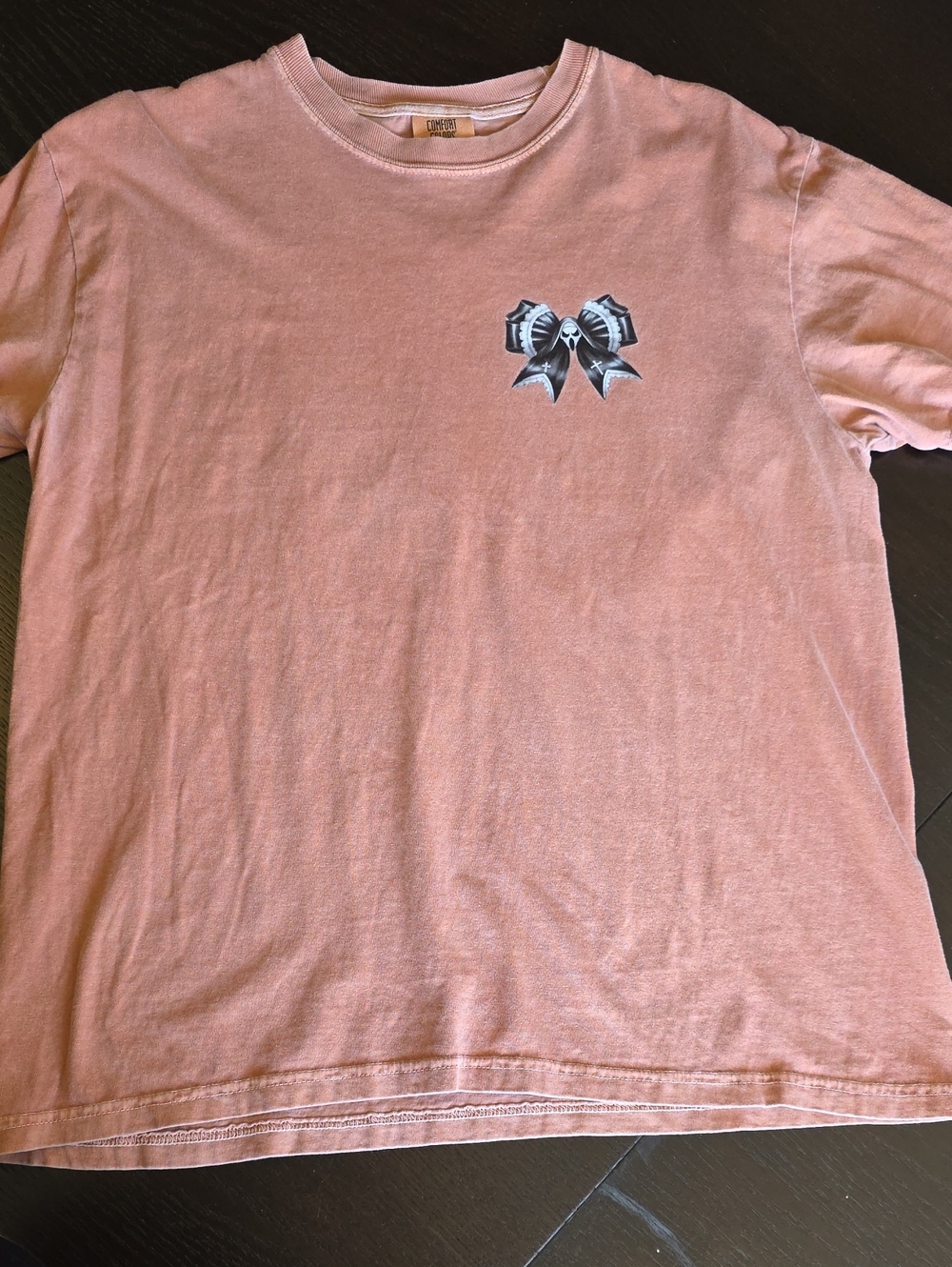 Comfort Colors Men's Light Pink Short-Sleeve Tee with Black Bow Graphic